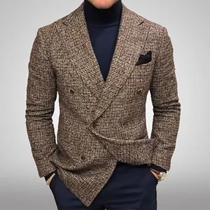Detail view of a men's double-breasted textured blazer with a stylish brown plaid pattern