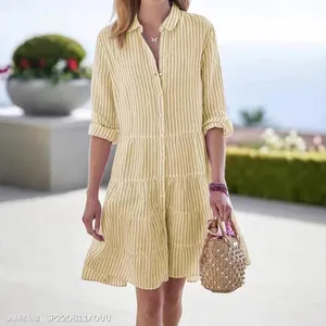 Elegant yellow and white vertical striped long sleeve shirt dress with tiered skirt for women