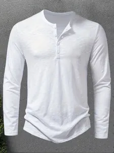 Men's white long-sleeve Henley t-shirt with a textured finish and classic three-button collar.