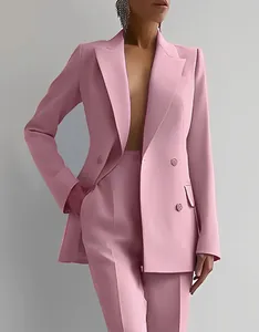 Close-up detail of a pink double-breasted professional blazer and pants suit set