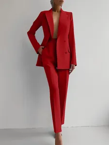 Professional red women's two-piece suit with double-breasted blazer and trousers