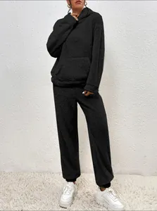 Detailed view of the cozy black fuzzy fleece loungewear set with hooded top and pants