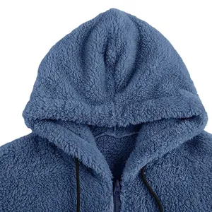 Detail of a blue men's fuzzy fleece hooded jacket with zip and drawstrings.