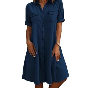 Stylish dark blue loose denim shirt dress with half sleeves and chest pocket details