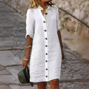 White cotton linen shirt dress with decorative large buttons and half sleeves for summer