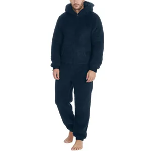 Comfortable men's warm navy blue plush hooded onesie pajamas with a front zipper closure.