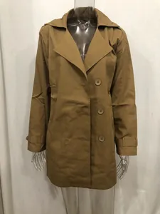Detail view of a men's camel mid-length slim fit trench coat on a clear mannequin.