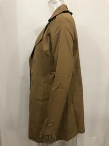 Side profile of a classic khaki men's mid-length trench coat on a mannequin.