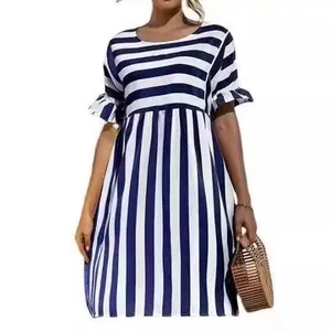 Casual navy and white striped dress with ruffled sleeves and vertical/horizontal patterns.