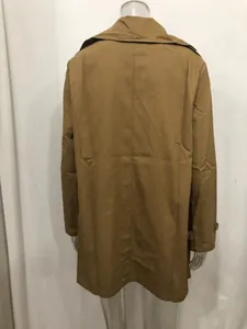 Detailed rear view of a classic mid-length camel men's trench coat on a mannequin.