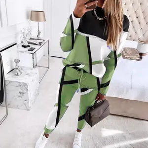 Stylish two-piece casual women's tracksuit set featuring green and black geometric prints