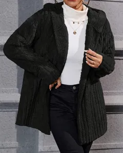 Close-up of women's black polar fleece hooded coat with vertical stripes for autumn