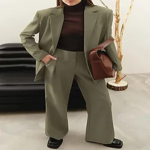 Modern professional women's olive green blazer and wide-leg trousers two-piece suit