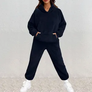 Cozy navy blue fleece hoodie and matching sweatpants set for women's winter loungewear.