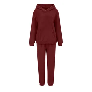 Close-up view showing the soft burgundy plush fleece texture of this women's tracksuit set