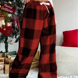 Warm winter red and black buffalo plaid fleece pajama pants with a cozy loose fit design