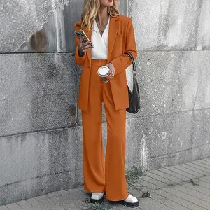 Elegant women's two-piece burnt orange blazer and wide-leg pants suit set for office wear