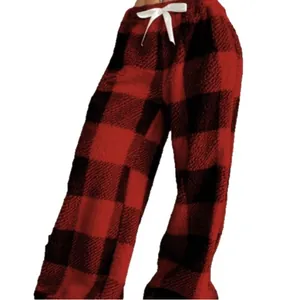 Cozy red and black buffalo plaid fleece lounge pants with a white ribbon drawstring