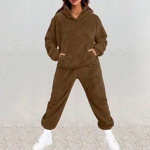 Close-up detail of women's plush hoodie and jogger set in dark brown