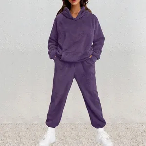 Cozy purple fuzzy two-piece loungewear set with hoodie and joggers for winter women