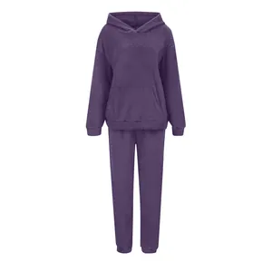 Close-up of a purple plush fleece hoodie and matching elastic waist sweatpants set