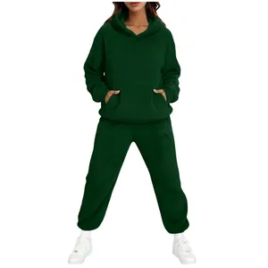 Close-up of women's dark green plush fleece hoodie and matching sweatpants set.