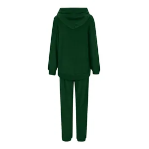 Back view of a dark green plush fleece hoodie and matching pants set for women