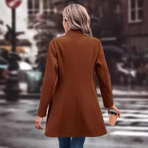 Back view of a women's slim fit brown wool coat in a stylish street setting.