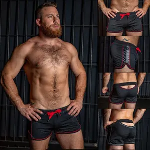 Detailed view of men's mesh sports shorts with unique and sexy back cutout design
