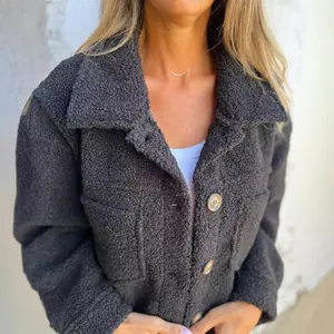 Stylish women's warm dark grey sherpa jacket with lapel and single-breasted buttons