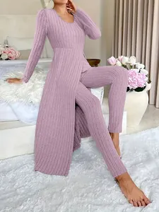 Elegante set due pezzi malva con top a maniche lunghe con spacco e leggings in maglia a coste
