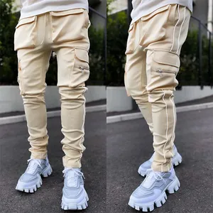 Men's beige reflective cargo joggers with multi-pockets and drawstring waist detail