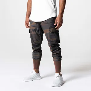 Close-up of men's camouflage cargo joggers with drawstring waist and ribbed cuffs