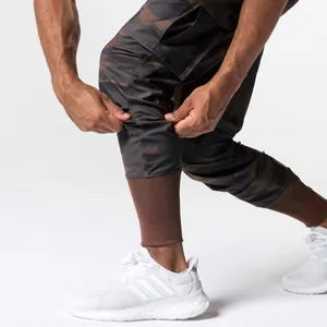 Close-up detail of camouflage cargo joggers featuring elastic ribbed cuffs for men's fitness