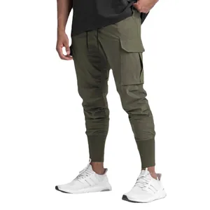 Men's olive green cargo joggers with multi-pockets and elasticated cuffs for gym and fitness