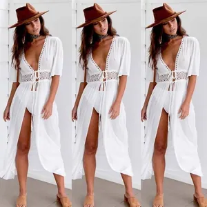White lace-up long cardigan beach cover-up with delicate hollow-out lace detailing
