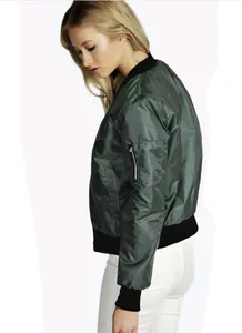Side view of a women's dark green shiny bomber jacket with sleeve zipper detail