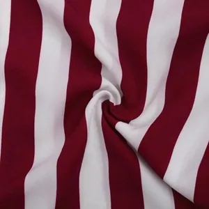 Close-up macro detail of soft burgundy and white vertical striped chiffon blouse fabric