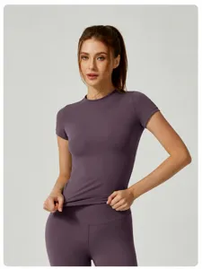 Detail view of a premium purple slim-fit short-sleeved yoga sports T-shirt for women