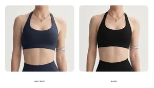 Dettaglio comparativo di reggiseni sportivi yoga all'americana in blu navy e nero