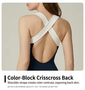 Close-up detail showing white criss-cross straps on a navy yoga bodysuit back design