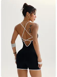 Back detail of a slim fit black criss-cross yoga jumpsuit for women's fitness and dance