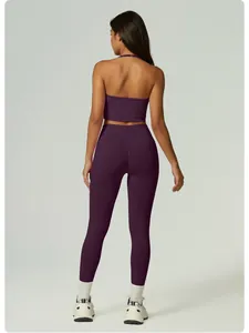 Back view of a purple seamless halter yoga set with high waist compression leggings