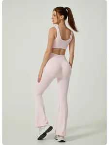 Professional back view of a pale pink high-waist yoga set with white trim on a female model