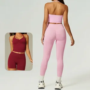 Pink halter backless yoga set with padded sports bra and high waist leggings