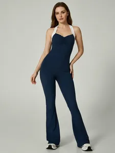 Slim fit navy blue halter neck flare jumpsuit with contrast white straps and V-neck