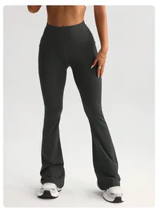 Detailed view of women's high-waisted flared yoga pants with peach butt lift design