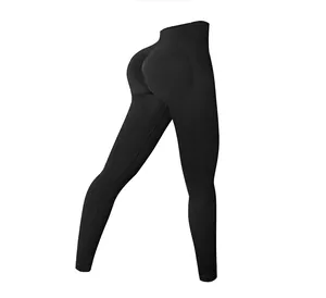 Detailed close-up of high-waist scrunch butt yoga leggings in black ribbed fabric
