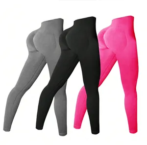 Detailed view of high-waisted butt-lifting yoga leggings in gray, black, and pink colors