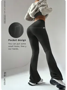 Detailed view showing the side pocket design on black high-waisted flare yoga pants